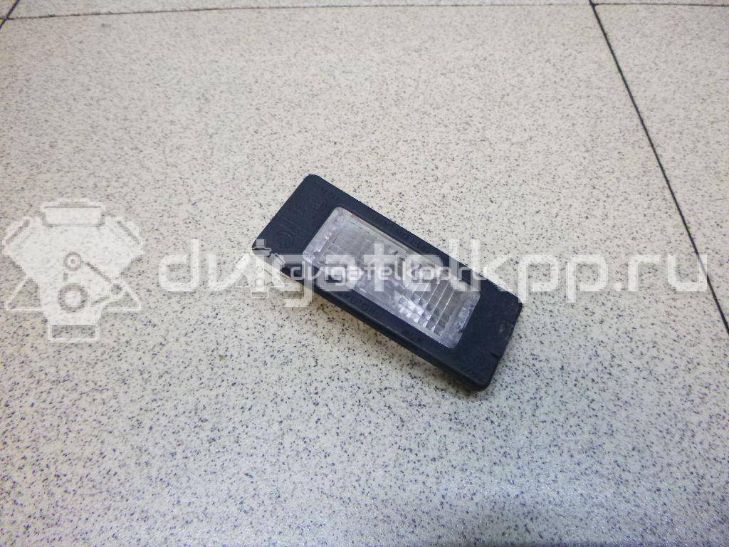 Фото Фонарь подсветки номера  5N0943021A для Seat Ibiza / Alhambra {forloop.counter}}