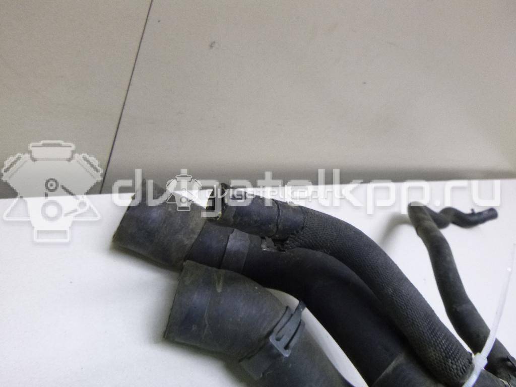 Фото Патрубок радиатора  5Q0121049AD для Seat Leon {forloop.counter}}