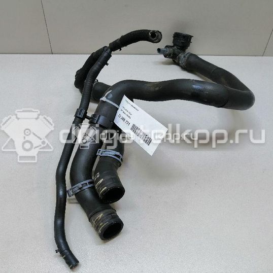 Фото Патрубок радиатора  5Q0121049AD для Seat Leon