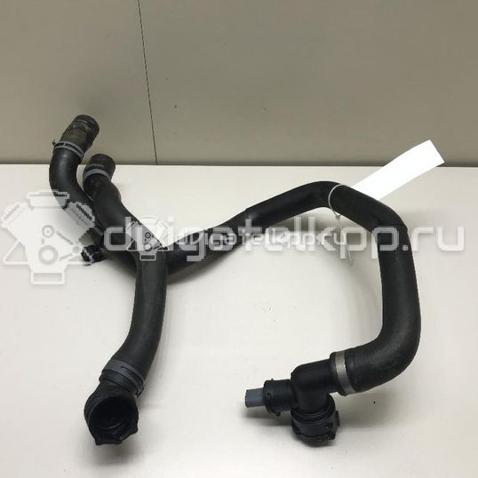 Фото Патрубок радиатора  5Q0121049AC для Seat Leon