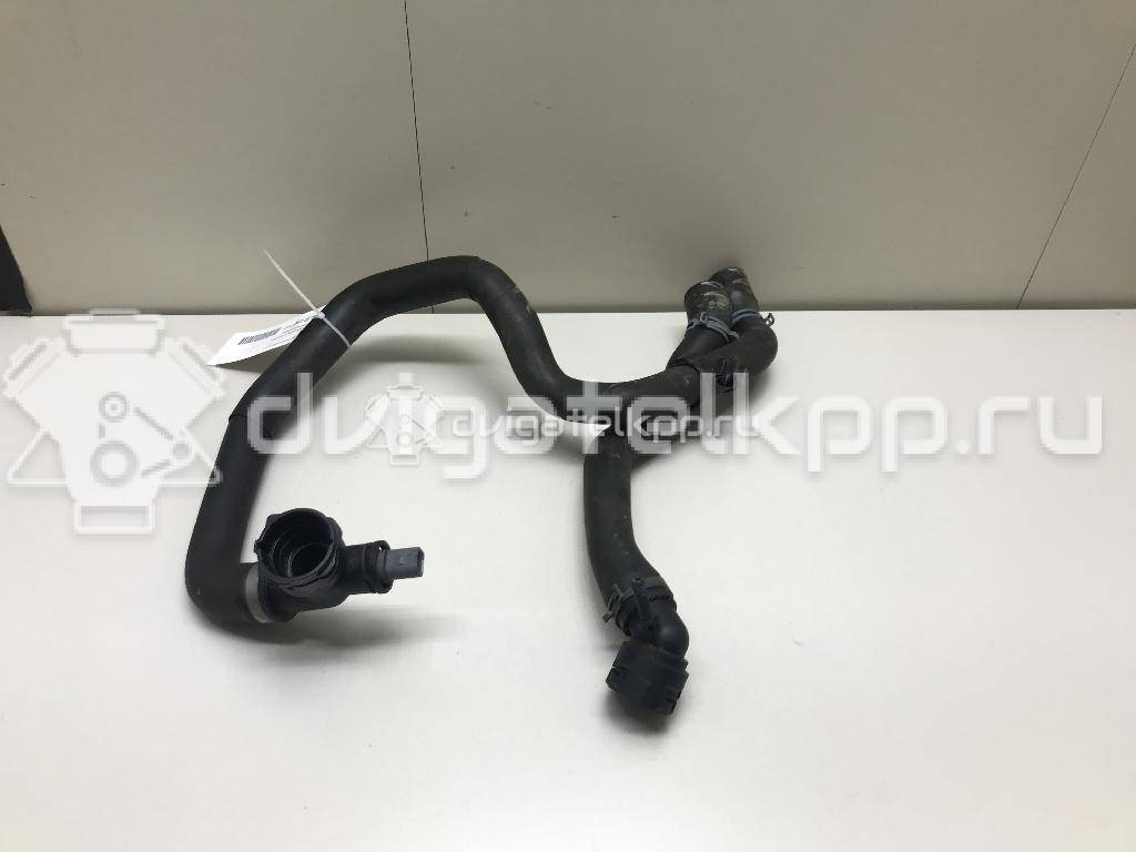 Фото Патрубок радиатора  5Q0121049AC для Seat Leon {forloop.counter}}