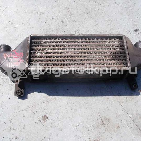 Фото Интеркулер  xs4q9l440bd для Ford Fiesta / Focus / Tourneo / Sierra / Transit