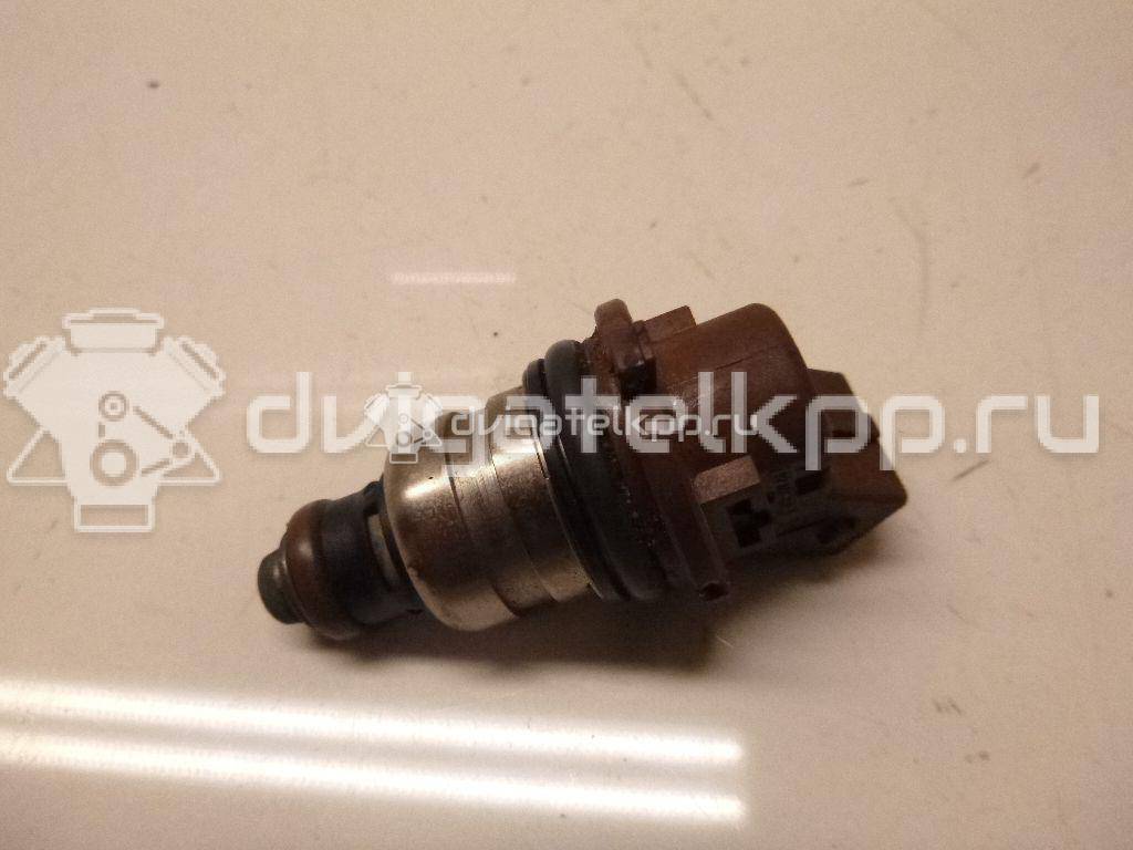 Фото Форсунка инжекторная электрическая  1038777 для Ford Fiesta / Puma Ec {forloop.counter}}