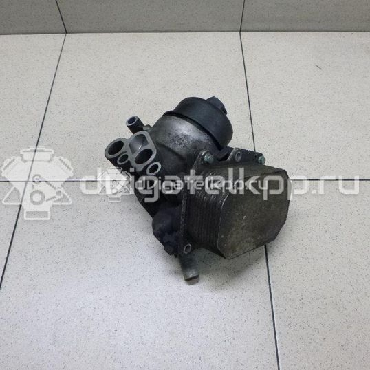 Фото Кронштейн масляного фильтра  1704048 для Ford Focus / Tourneo / C-Max / Galaxy / Grand