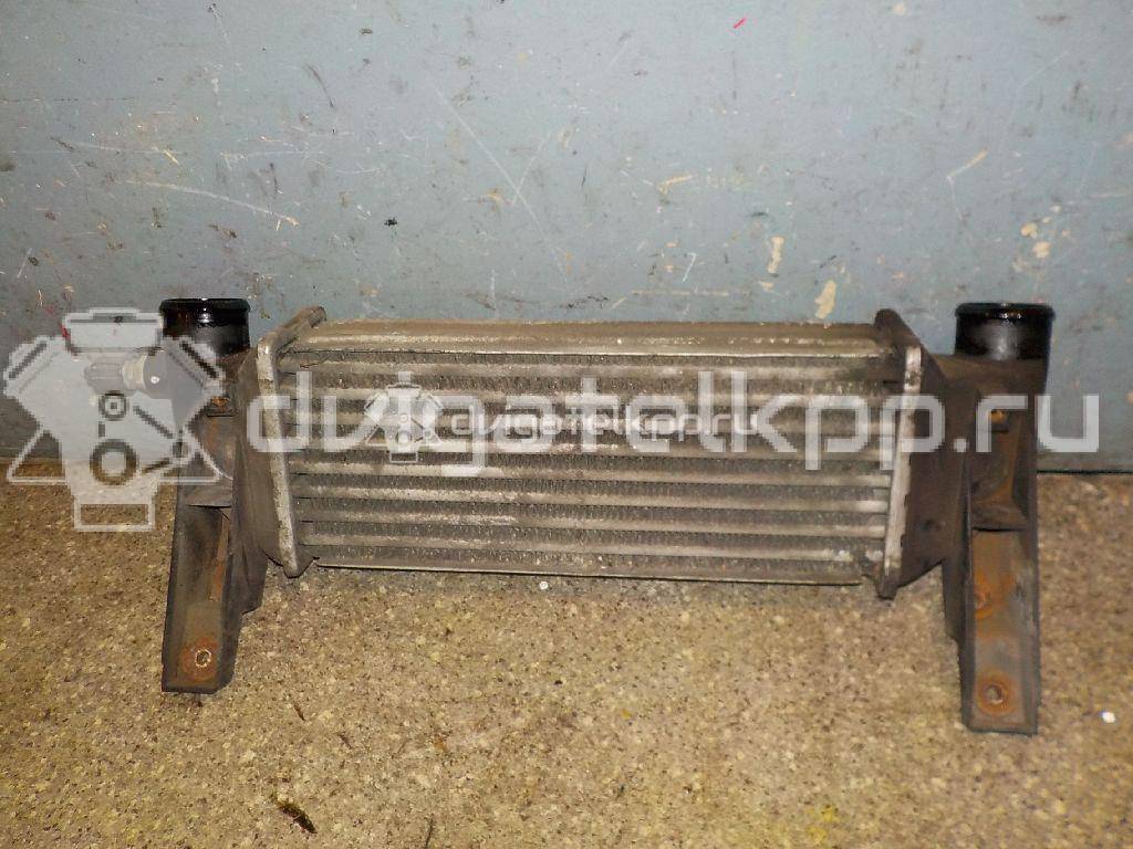 Фото Интеркулер  4548369 для Ford Fiesta / Focus / Tourneo / Sierra / Transit {forloop.counter}}