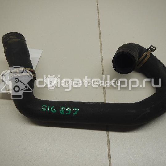 Фото Патрубок радиатора  1384148 для volvo S40