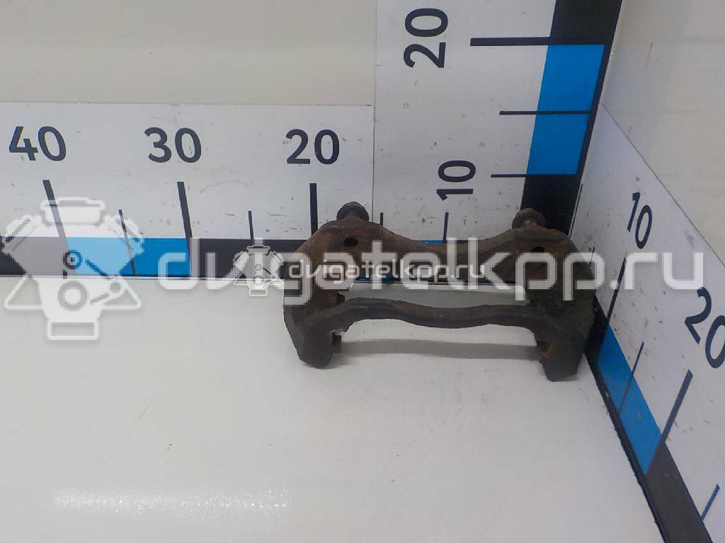 Фото Скоба суппорта переднего  MR569361 для Mitsubishi Lancer / Outlander {forloop.counter}}