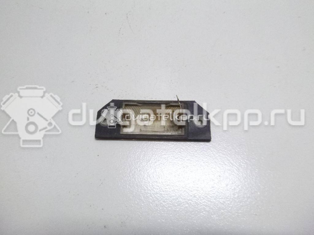 Фото Фонарь подсветки номера  4502331 для Ford Focus / C-Max {forloop.counter}}