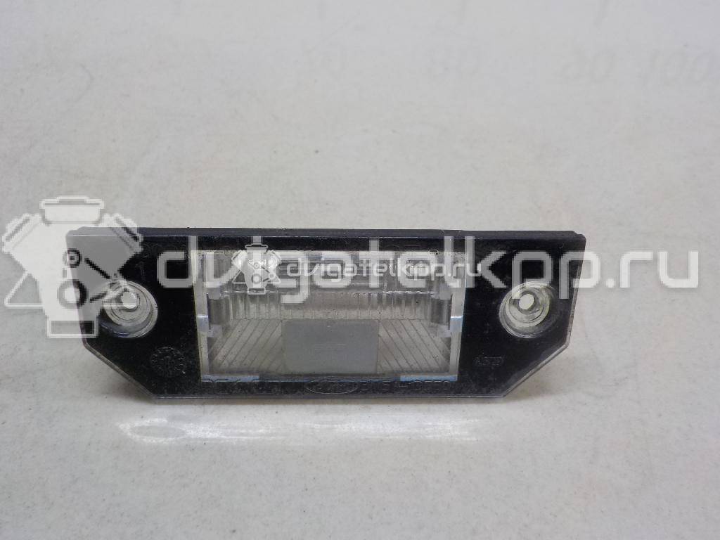 Фото Фонарь подсветки номера  4502331 для Ford Focus / C-Max {forloop.counter}}