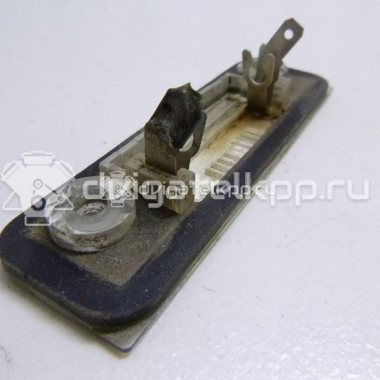 Фото Фонарь подсветки номера  1332916 для Ford Fiesta / Mondeo / Fusion Ju