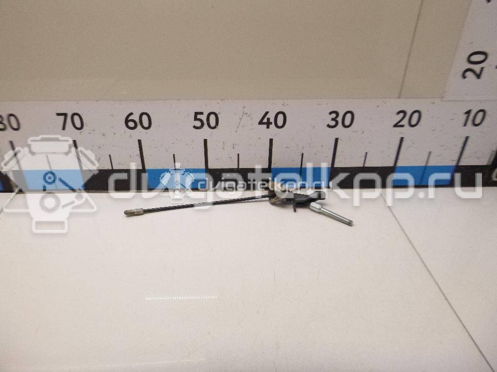 Фото Трос стояночного тормоза центральный  1900071 для Ford Focus / Tourneo / Transit {forloop.counter}}