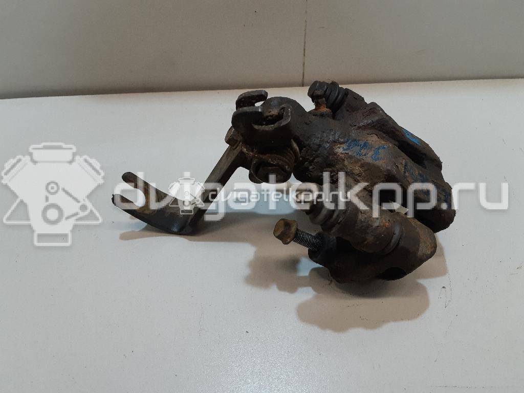 Фото Суппорт тормозной задний правый  0K2N349980 для Kia Shuma Fb / Carens / Sephia Fa / Clarus {forloop.counter}}