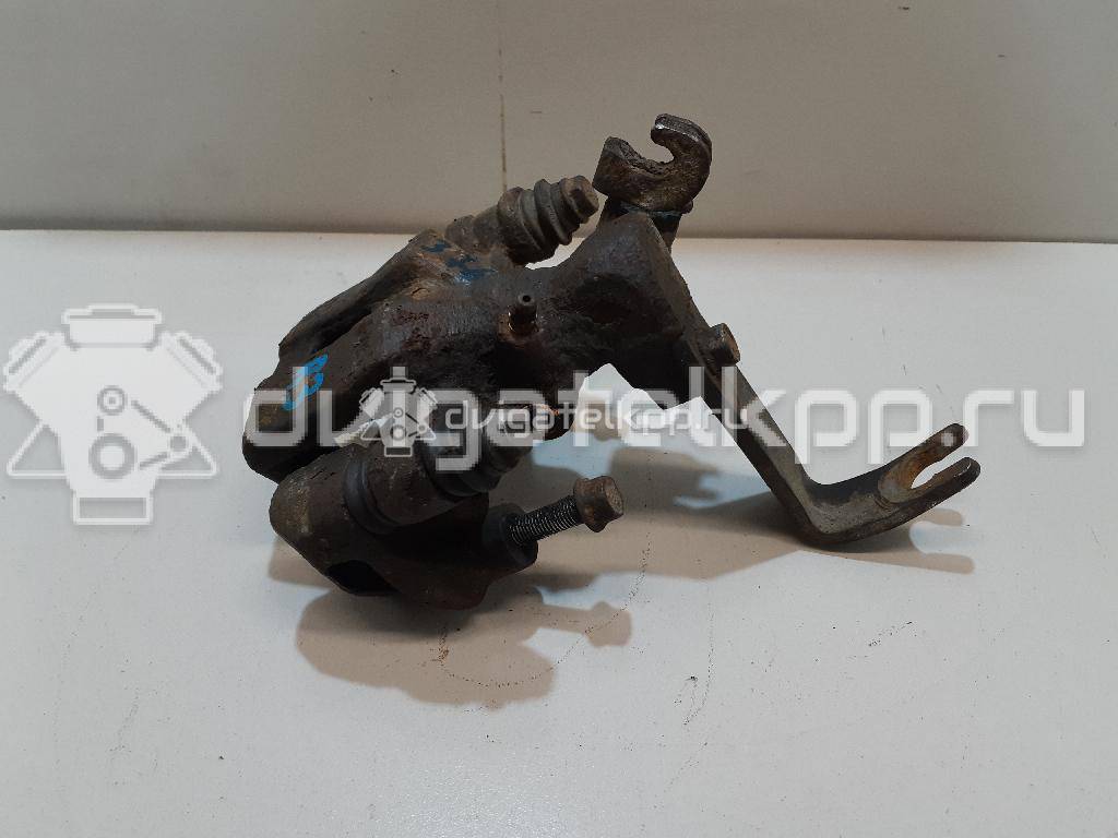 Фото Суппорт тормозной задний правый  0K2N349980 для Kia Shuma Fb / Carens / Sephia Fa / Clarus {forloop.counter}}