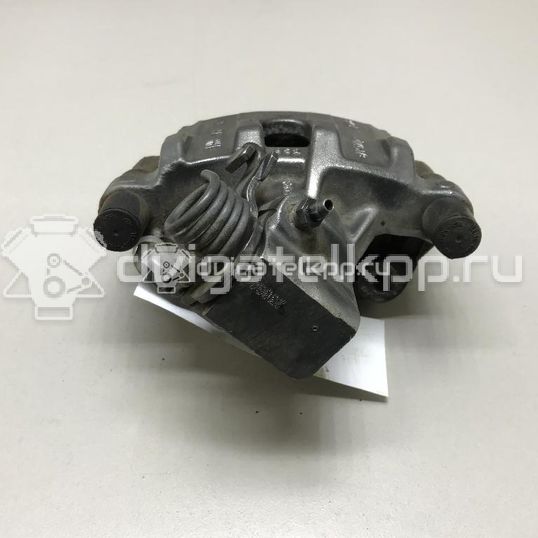 Фото Суппорт тормозной задний правый  1365648 для mazda Mazda 3 (BK)