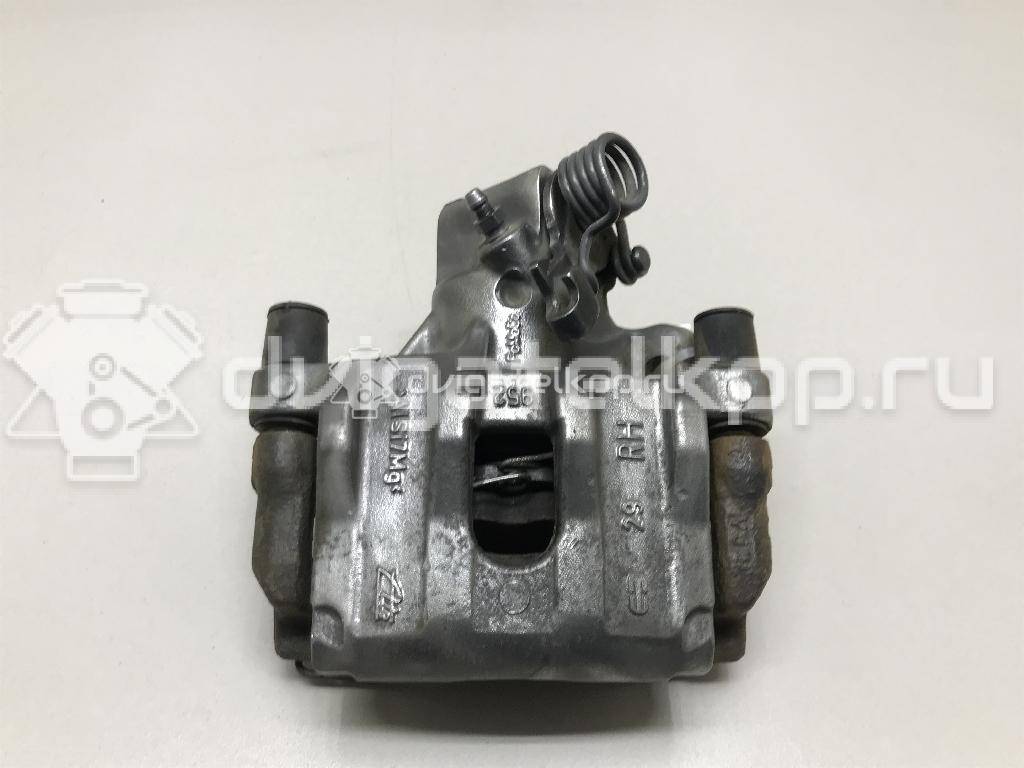 Фото Суппорт тормозной задний правый  1365648 для mazda Mazda 3 (BK) {forloop.counter}}