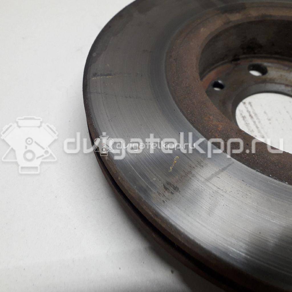 Фото Диск тормозной передний вентилируемый  402064AA1A для Nissan Note / Tiida / Micra {forloop.counter}}