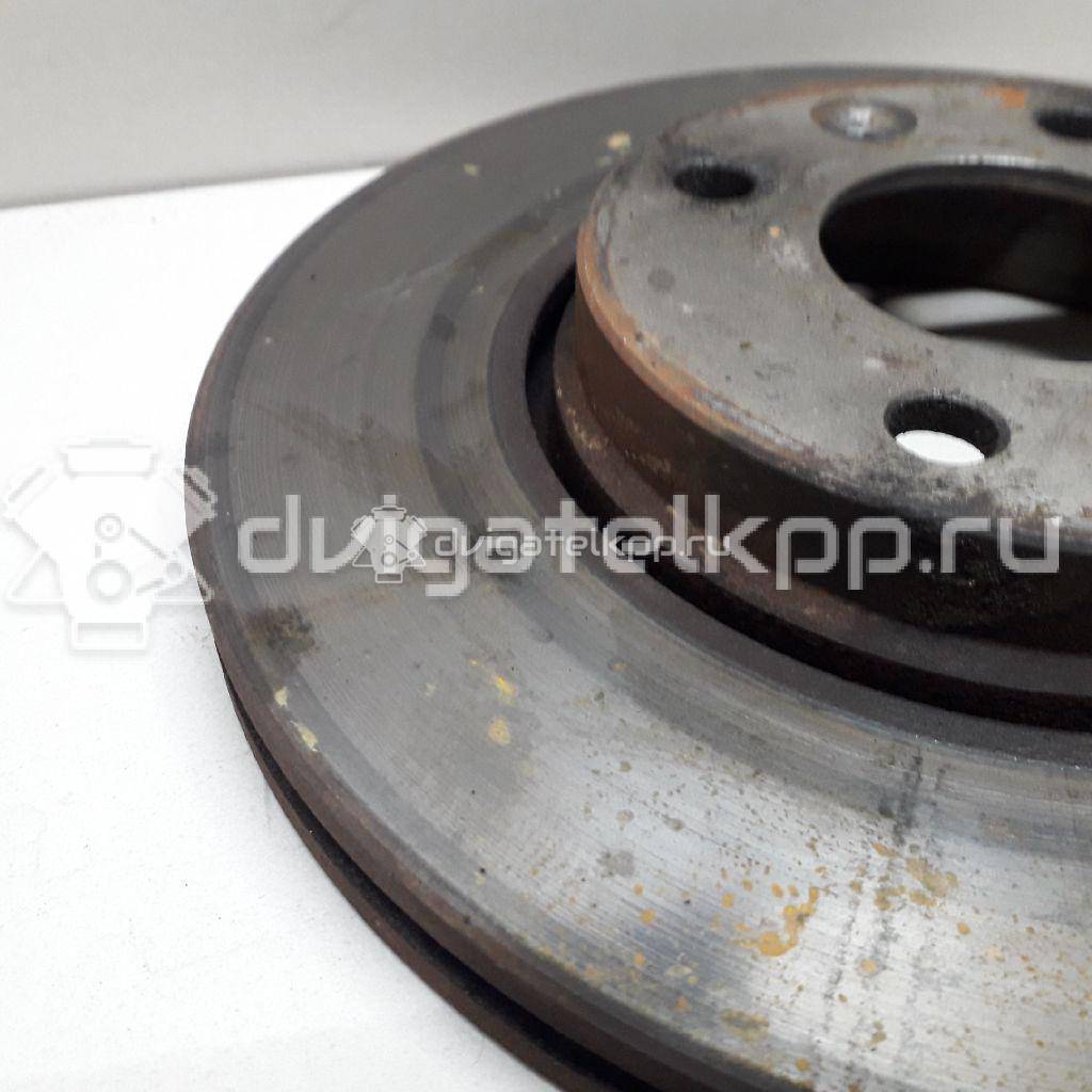 Фото Диск тормозной передний вентилируемый  402064AA1A для Nissan Note / Tiida / Micra {forloop.counter}}