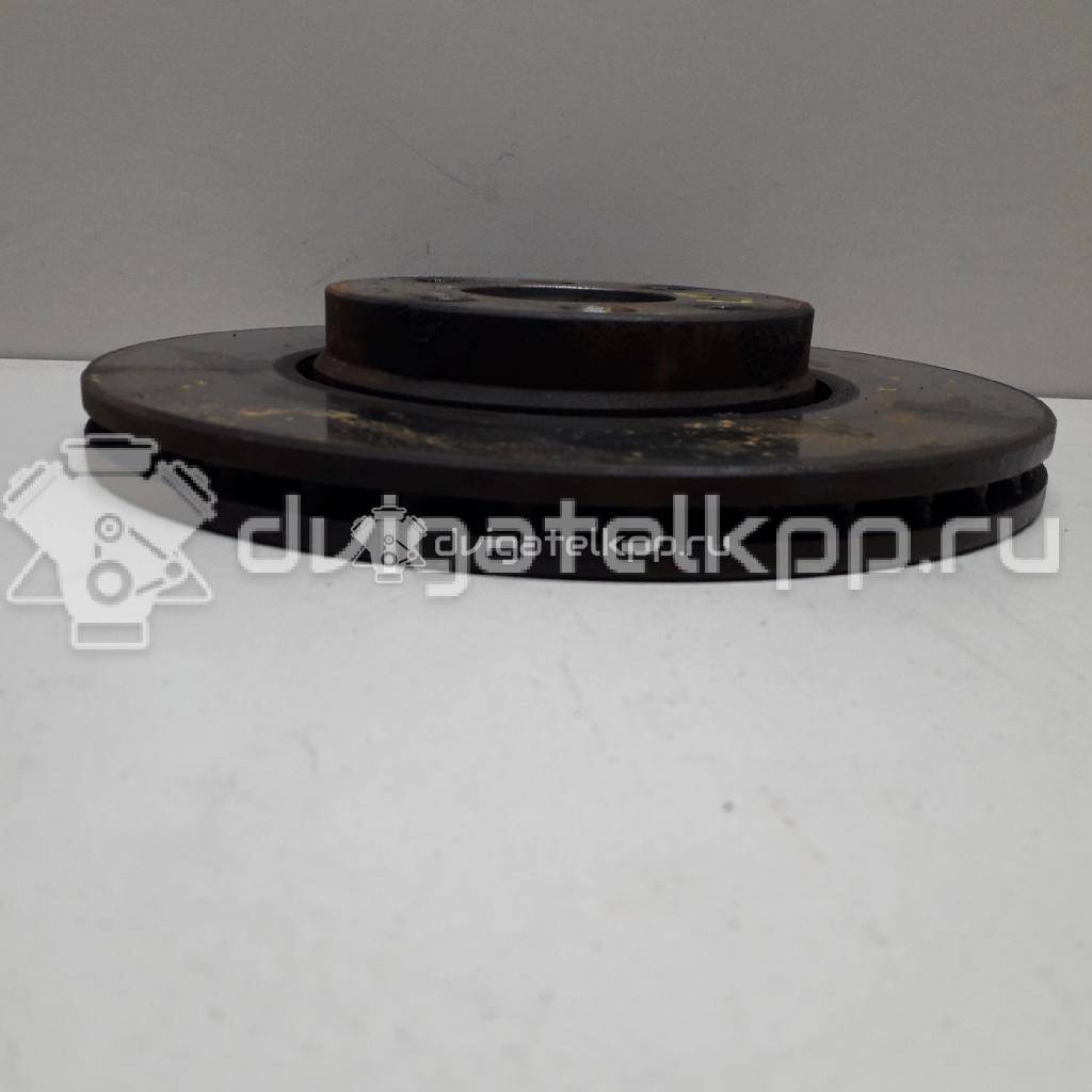 Фото Диск тормозной передний вентилируемый  402064AA1A для Nissan Note / Tiida / Micra {forloop.counter}}