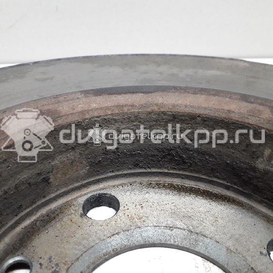 Фото Диск тормозной передний вентилируемый  402064AA1A для Nissan Note / Tiida / Micra