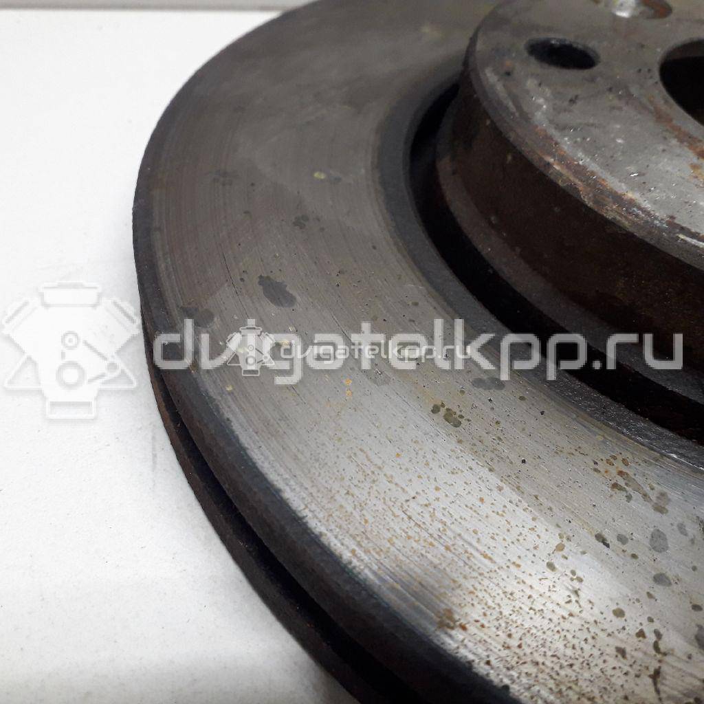Фото Диск тормозной передний вентилируемый  402064AA1A для Nissan Note / Tiida / Micra {forloop.counter}}