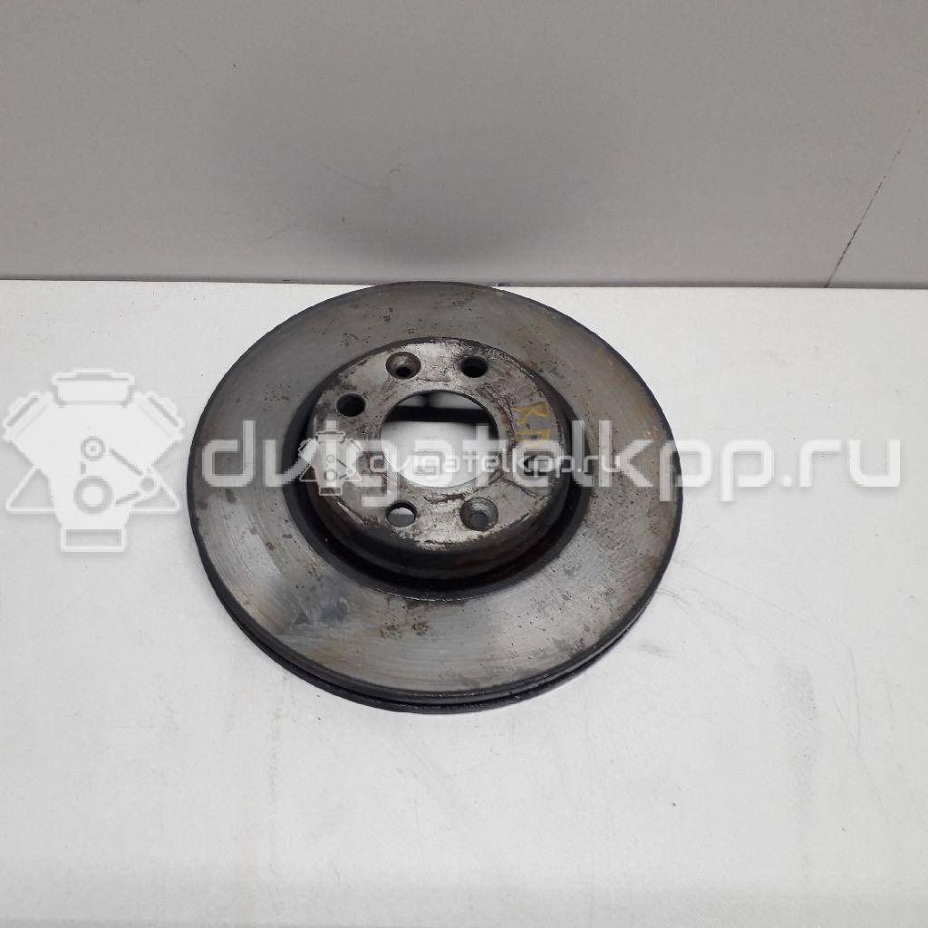 Фото Диск тормозной передний вентилируемый  402064AA1A для Nissan Note / Tiida / Micra {forloop.counter}}