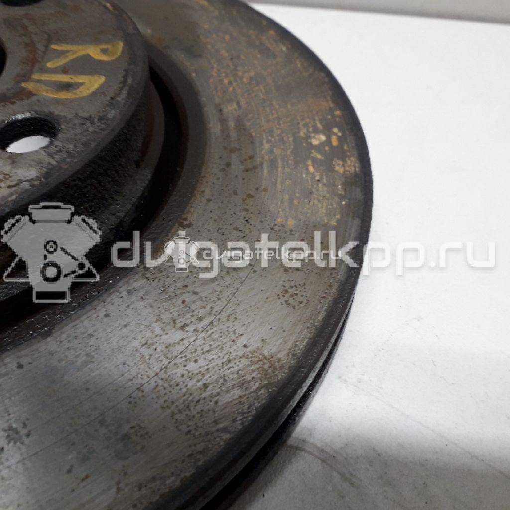 Фото Диск тормозной передний вентилируемый  402064AA1A для Nissan Note / Tiida / Micra {forloop.counter}}