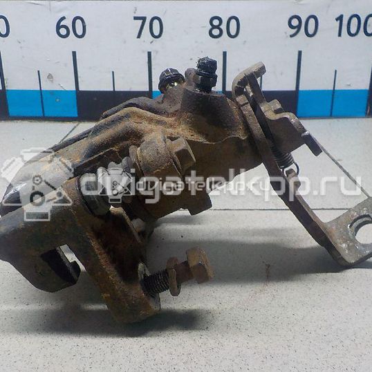Фото Суппорт тормозной задний правый  44001BM40A для Nissan Primera / Almera