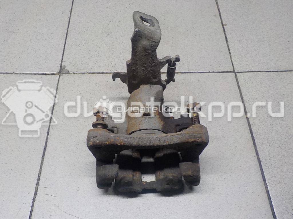 Фото Суппорт тормозной задний правый  44001BM40A для Nissan Primera / Almera {forloop.counter}}