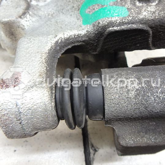 Фото Суппорт тормозной задний левый  440111KD0A для Nissan Tiida / Qashqai / Cube Z12 / Juke F15 / Pulsar C13