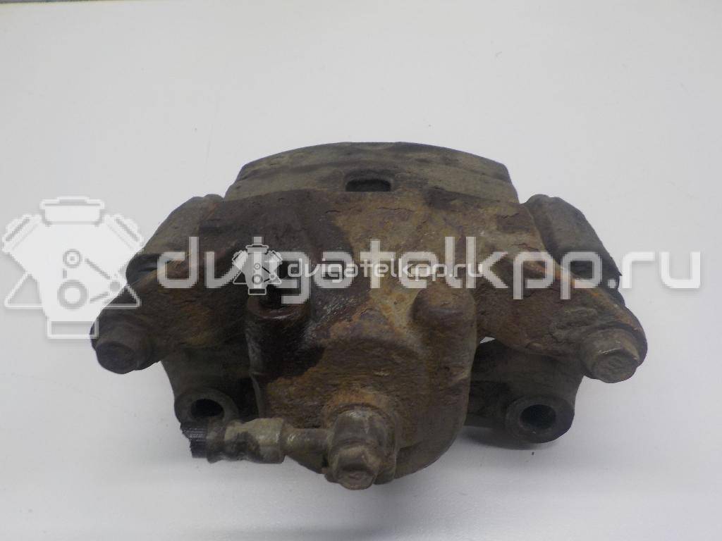 Фото Суппорт тормозной передний левый  41011JN00A для Nissan Juke F15 / Pulsar C13 {forloop.counter}}