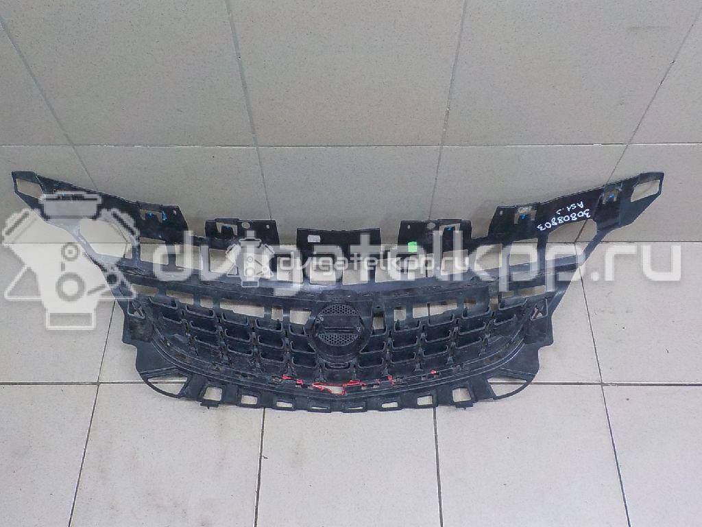 Фото Решетка радиатора  1320167 для Opel Astra {forloop.counter}}