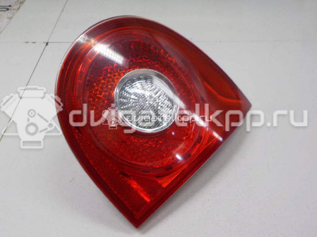 Фото Фонарь задний внутренний правый  1K6945094G для Volkswagen Golf {forloop.counter}}