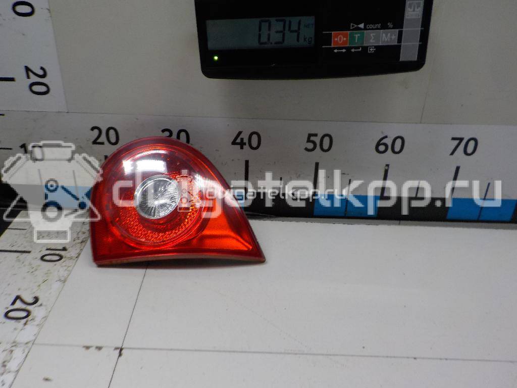 Фото Фонарь задний внутренний правый  1K6945094G для Volkswagen Golf {forloop.counter}}
