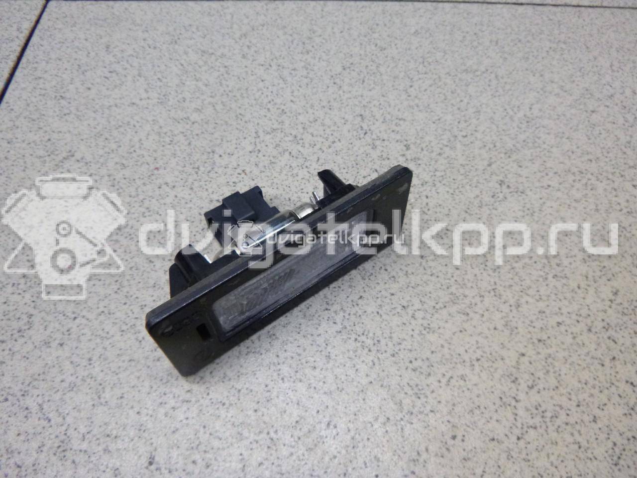 Фото Фонарь подсветки номера  8T0943021 для vw Passat [B6] {forloop.counter}}