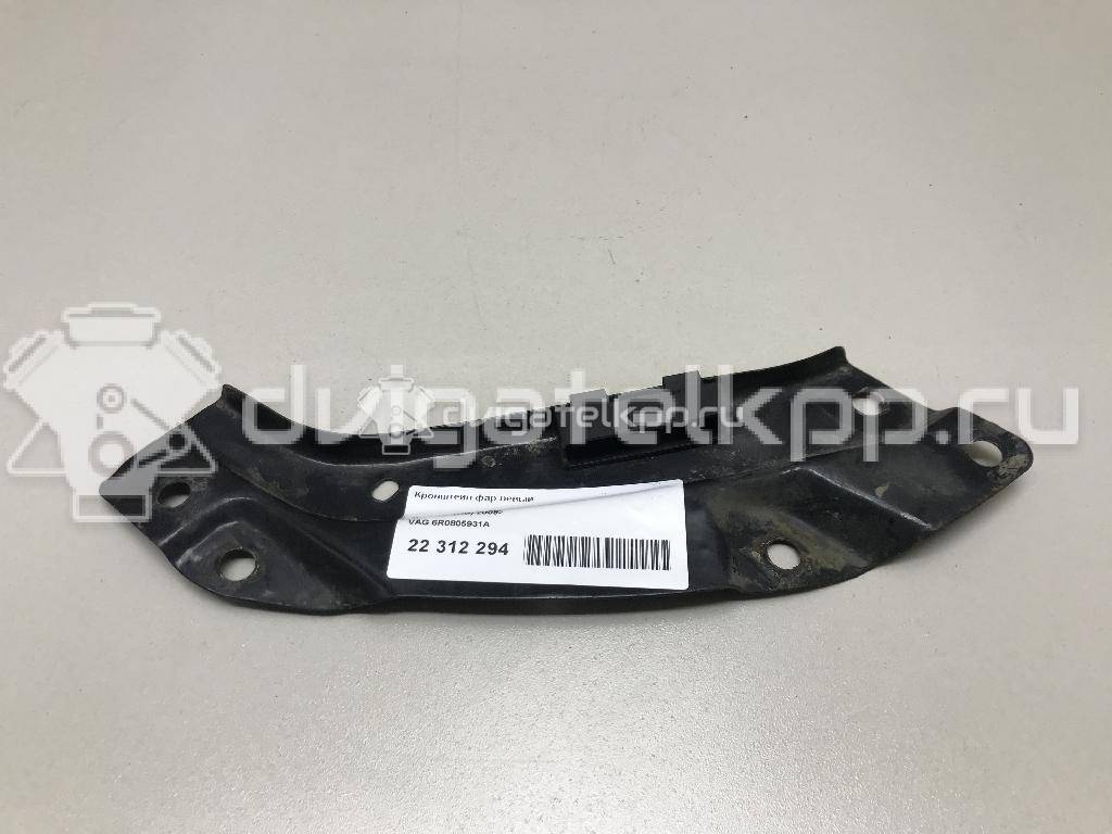 Фото Кронштейн фар левый  6R0805931A для Volkswagen Polo / Jetta {forloop.counter}}