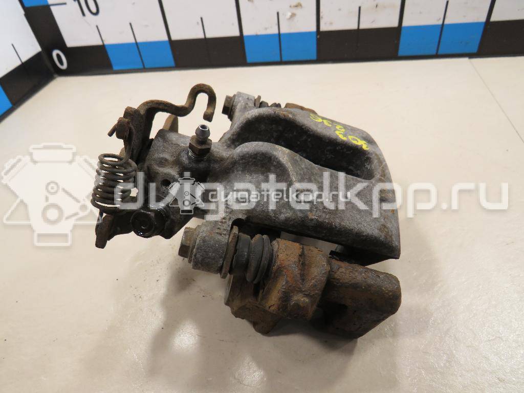 Фото Суппорт тормозной задний левый  4785002100 для Toyota Corolla / Auris {forloop.counter}}