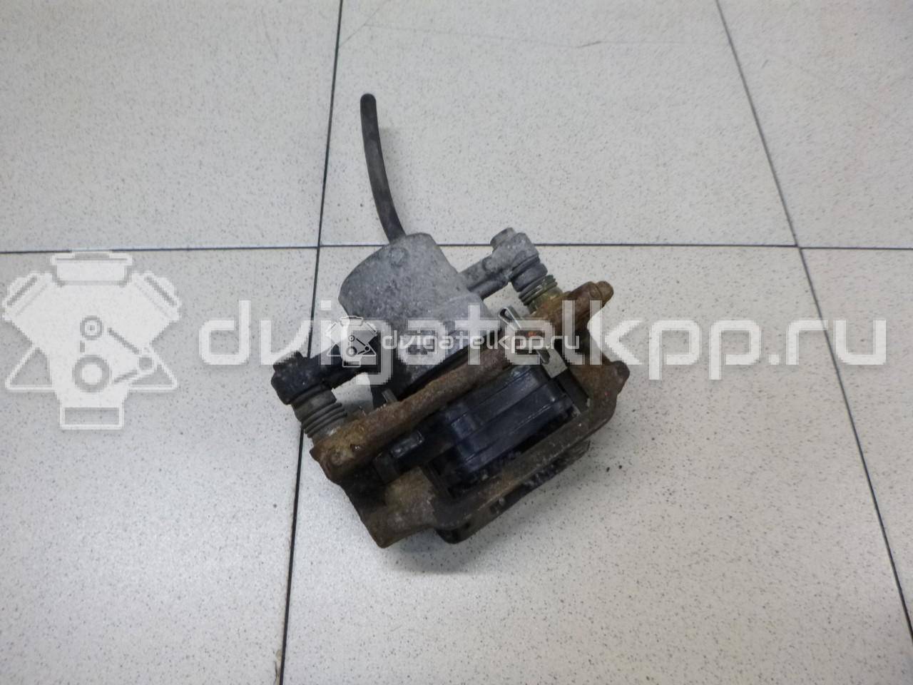 Фото Суппорт тормозной задний левый  4775005071 для Toyota Corolla / Avensis {forloop.counter}}