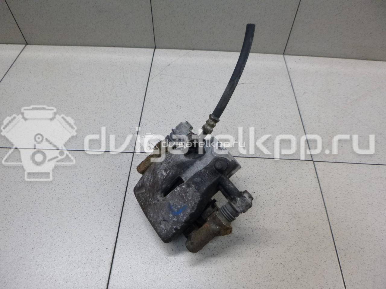 Фото Суппорт тормозной задний левый  4775005071 для Toyota Corolla / Avensis {forloop.counter}}