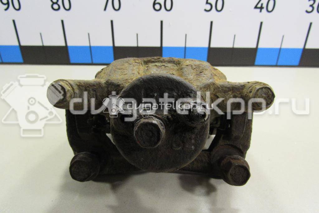 Фото Суппорт тормозной передний правый  4773052020 для Toyota Yaris / Mr 2 {forloop.counter}}