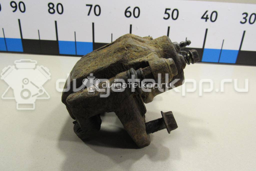 Фото Суппорт тормозной передний правый  4773052020 для Toyota Yaris / Mr 2 {forloop.counter}}