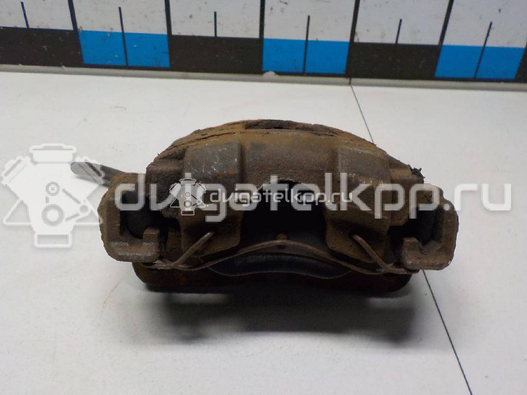 Фото Суппорт тормозной передний правый  477300D070 для Toyota Yaris {forloop.counter}}