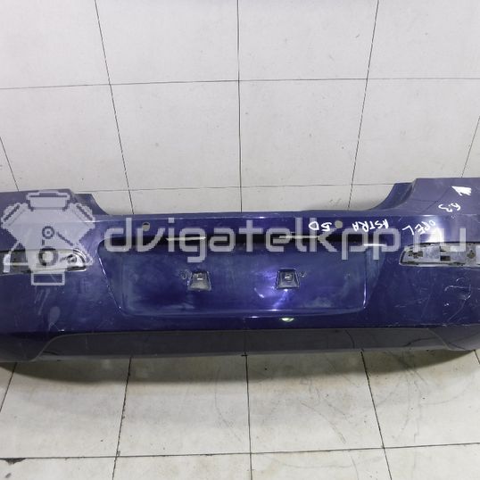 Фото Бампер задний  1404177 для Opel Astra