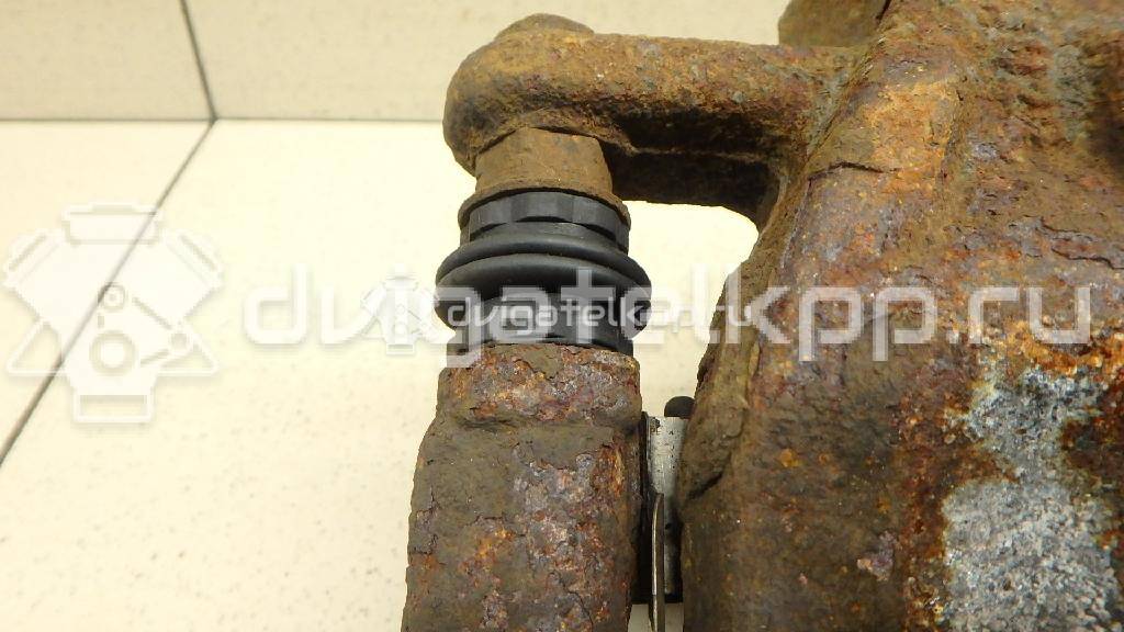 Фото Суппорт тормозной передний левый  7701208332 для vaz Lada Largus {forloop.counter}}