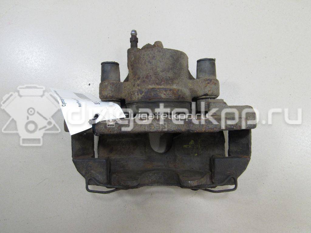 Фото Суппорт тормозной передний левый  1682876 для volvo C30 {forloop.counter}}