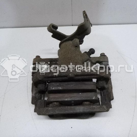 Фото Суппорт тормозной задний левый  13300861 для Chevrolet Cruze / Orlando J309 / Aveo / Volt