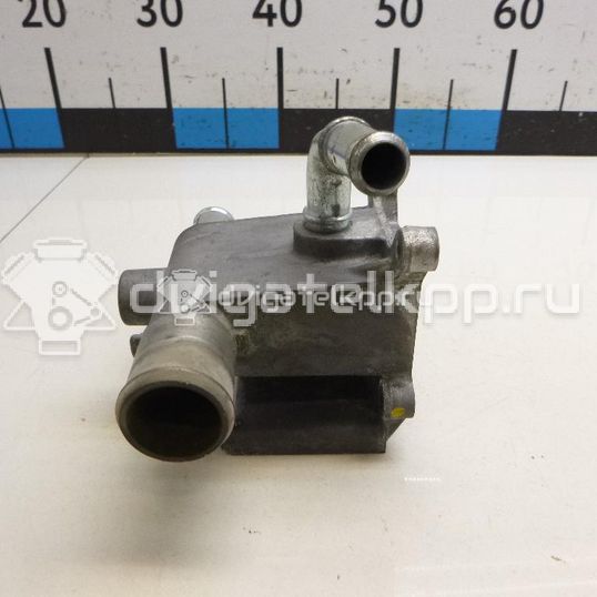 Фото Фланец двигателя системы охлаждения  1450955 для Ford Fiesta / Focus / Tourneo / C-Max / Galaxy