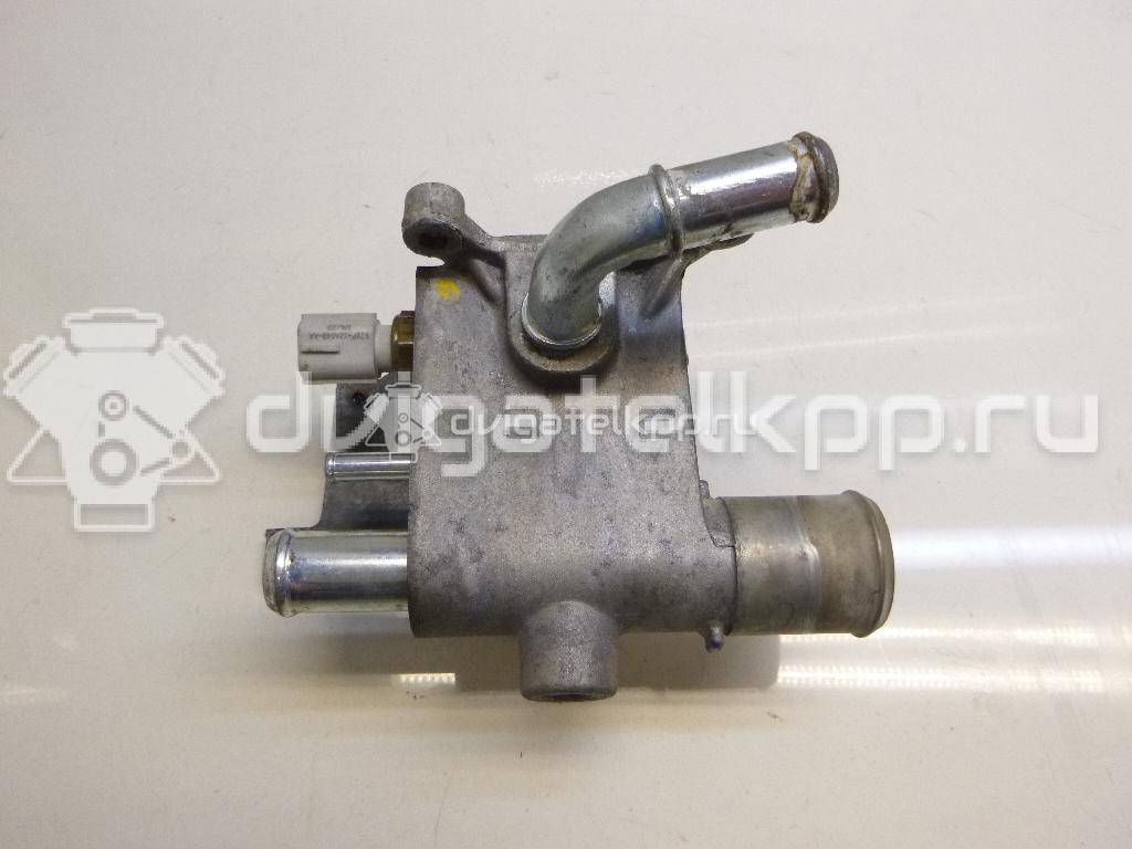 Фото Фланец двигателя системы охлаждения  1450955 для Ford Fiesta / Focus / Tourneo / C-Max / Galaxy {forloop.counter}}