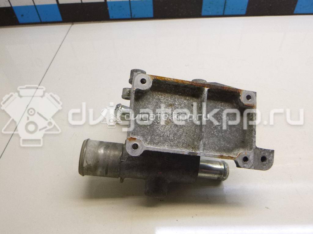 Фото Фланец двигателя системы охлаждения  1450955 для Ford Fiesta / Focus / Tourneo / C-Max / Galaxy {forloop.counter}}