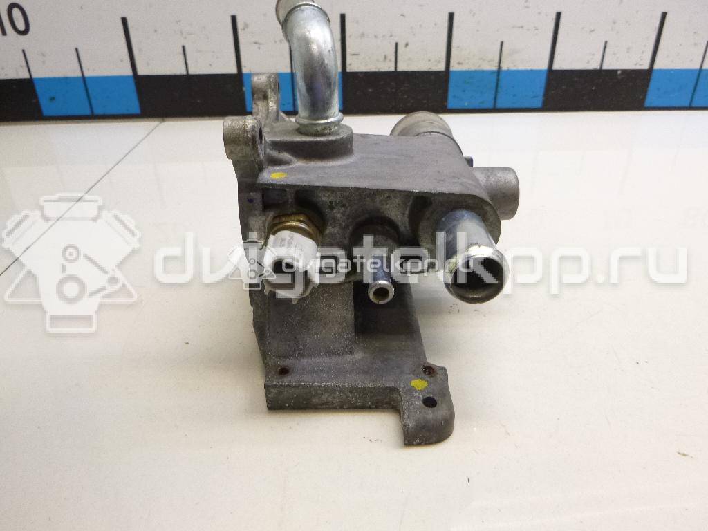 Фото Фланец двигателя системы охлаждения  1450955 для Ford Fiesta / Focus / Tourneo / C-Max / Galaxy {forloop.counter}}