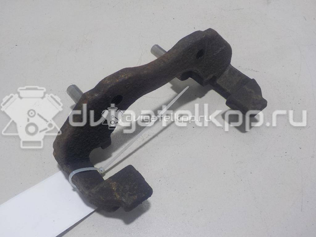 Фото Скоба суппорта переднего  1471710 для Ford Focus / C-Max {forloop.counter}}